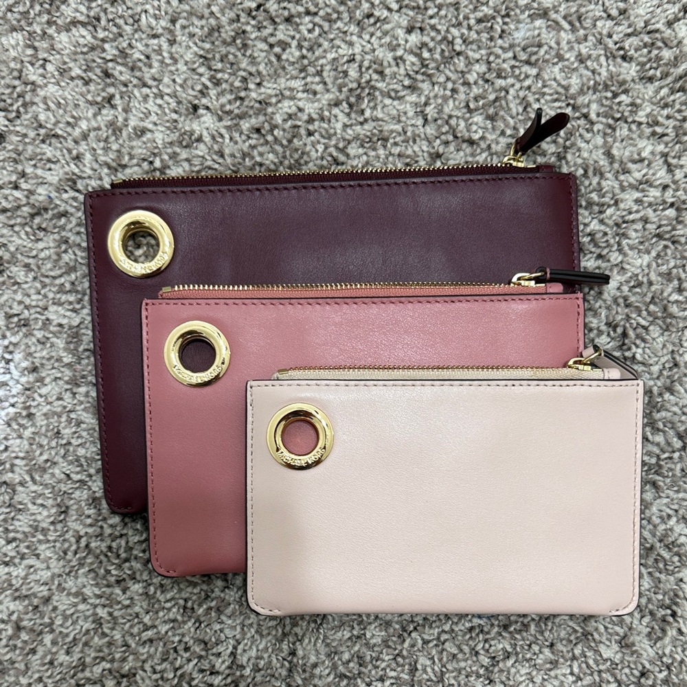Michael Kors Burgundy, Pink, and Cream Clutch Trio